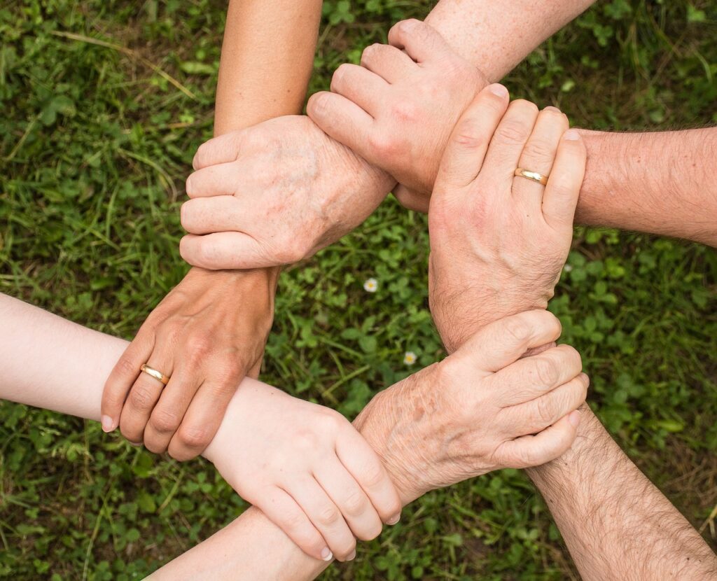 Family holding hands, mother, daughter, grandmother, grandfather, husband, wife, son, dad, happy, balanced.jpg